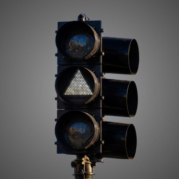 Transit signal assembly with circular and triangular indications.