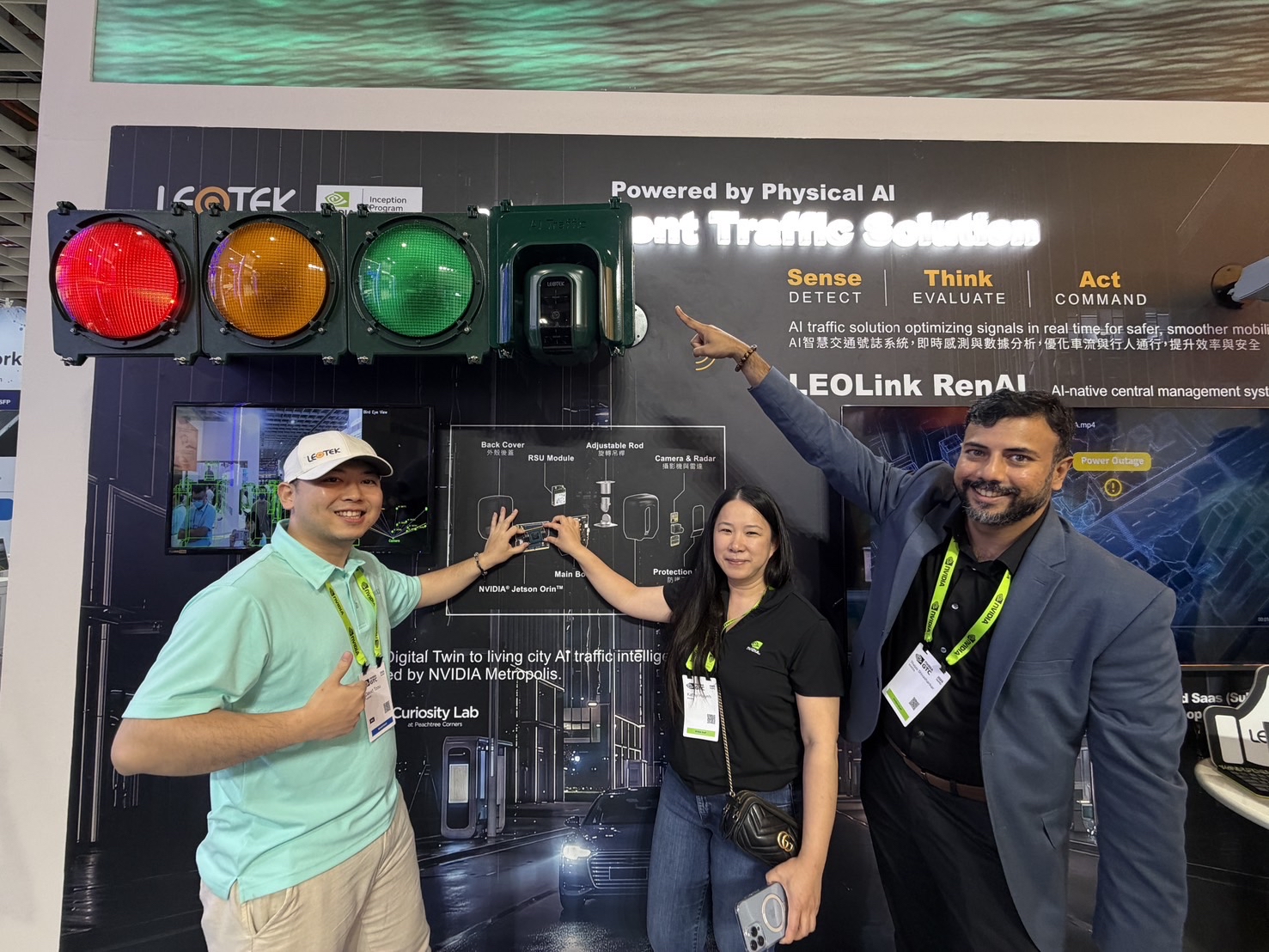 Thejas Gupta Shivashankar (right), Head of BD & Partner Ecosystem at NVIDIA, alongside David (left), AI Solution Architect at LEOTEK, showcasing the InterLux AI Traffic Signal System at Computex.